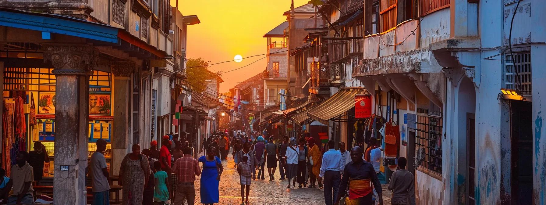 a vibrant sunset illuminates the colorful stone architecture of stonetown, zanzibar, as lively travelers explore the bustling streets filled with culture and charm.